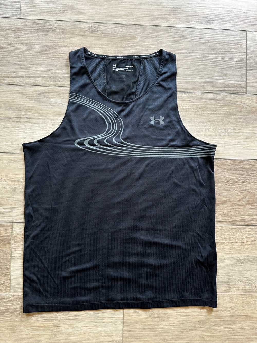 2 for 1 deal Under Armour Black and Teal Tanks with Silver Wave Detail